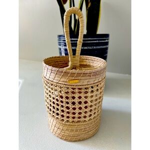 Anthropologie rattan utensil caddy for your counter top.